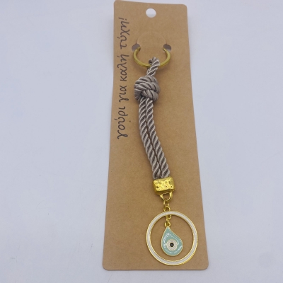 γουρι μπρελοκ 17cm κορδονι μοκκα κυκλος/ματι μεντα